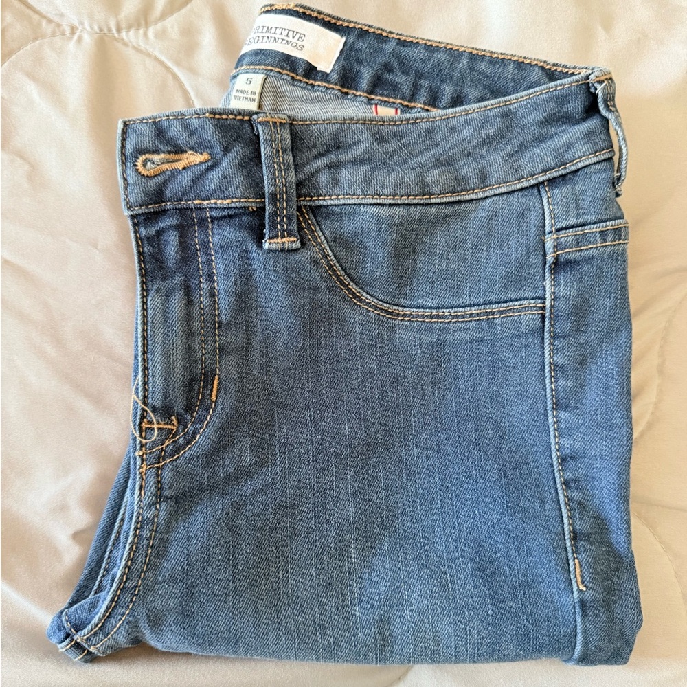 Mid rise medium wash stretch skinny jeans